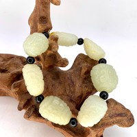 Четки нефрит орнамент 7 бусин 30х20 мм 