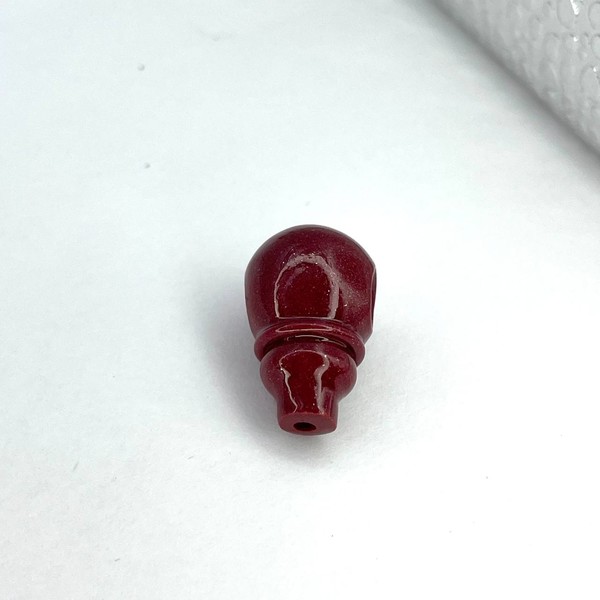 Голова Будды киноварь 12х20 мм