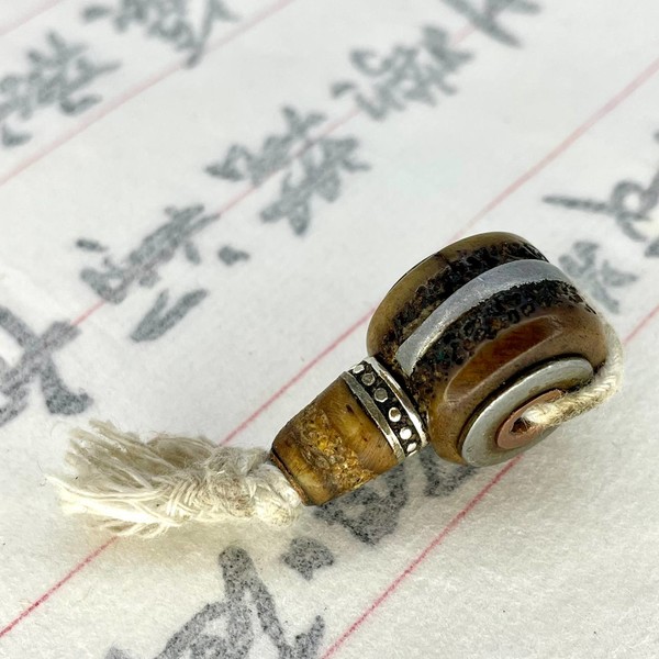 Голова Будды кость 13х27 мм