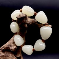 Четки нефрит галька 8 бусин 22х25 мм