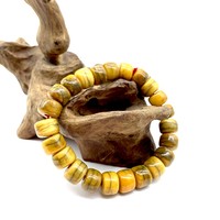 Четки кость 23 бусины 12х9 мм